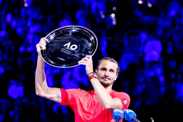 MELBOURNE, VIC - JANUARY 26: Alexander Zverev of Germany raises his finalist trophy after the Men s Singles Final of the 2025 Australian Open on January 26 2025, at Melbourne Park in Melbourne, Australia. (Photo by Jason Heidrich Icon Sportswire) TENNIS: JAN 26 Australian Open EDITORIAL USE ONLY Icon250126017