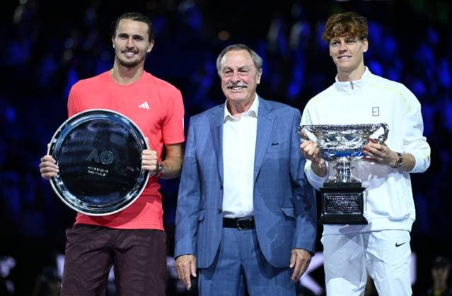 TENNIS AUSTRALIAN OPEN, Alexander Zverev of Germany and Jannik Sinner of Italy pose with John Newcombe (centre) following the Men?s singles final at the 2025 Australian Open at Melbourne Park in Melbourne, Sunday, January 26, 2025. ( NO ARCHIVING, EDITORIAL USE ONLY, NO USE IN BOOKS WITHOUT CONSENT MELBOURNE VICTORIA AUSTRALIA  Copyright: xJOELxCARRETTx 20250126127595516354
