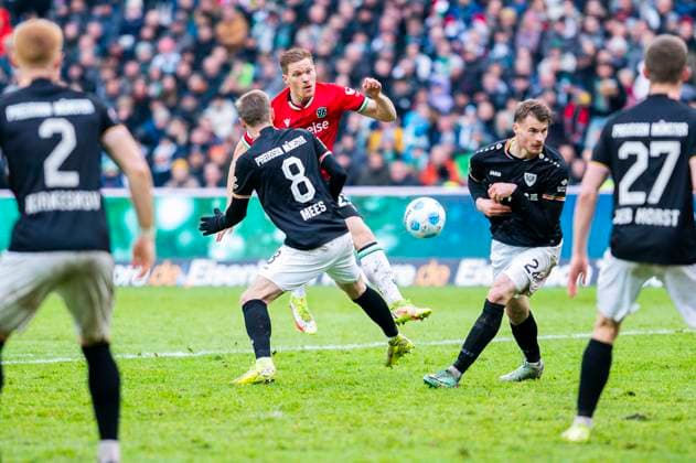 26 01 2025 Soccer, 2024 2025, 2 Bundesliga, Matchday 19, Hannover 96 SC Preußen Münster L R Joshua Mees Münster , Marcel Halstenberg Hannover , Niko Koulis Münster DFL REGULATIONS PROHIBIT ANY USE OF PHOTOGRAPHS AS IMAGE SEQUENCES AND OR QUASI VIDEO Hannover Lower Saxony Germany Heinz von Heiden Arena
