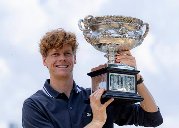 (250127) -- MELBOURNE, Jan. 27, 2025 -- Jannik Sinner of Italy poses with the trophy during the Australian Open winner photo shoot at the Albert Park Lake, in Melbourne, Australia, Jan. 27, 2025. (Photo by Xinhua) (SP)AUSTRALIA-MELBOURNE-TENNIS-AUSTRALIAN OPEN-TROPHY ChuxChen 