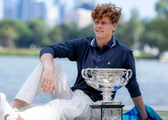 (250127) -- MELBOURNE, Jan. 27, 2025 -- Jannik Sinner of Italy poses with the trophy during the Australian Open winner photo shoot at the Albert Park Lake, in Melbourne, Australia, Jan. 27, 2025. (Photo by Xinhua) (SP)AUSTRALIA-MELBOURNE-TENNIS-AUSTRALIAN OPEN-TROPHY ChuxChen 