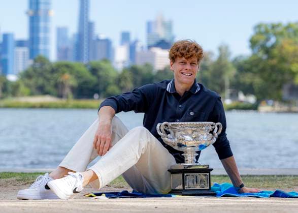 (250127) -- MELBOURNE, Jan. 27, 2025 -- Jannik Sinner of Italy poses with the trophy during the Australian Open winner photo shoot at the Albert Park Lake, in Melbourne, Australia, Jan. 27, 2025. (Photo by Xinhua) (SP)AUSTRALIA-MELBOURNE-TENNIS-AUSTRALIAN OPEN-TROPHY ChuxChen 