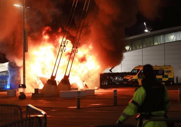 A merchandise stall on fire outside the stadium ahead of the match Manchester City v Club Brugge, UEFA Champions League, Group Stage, Football, Etihad Stadium, Manchester, UK - 29 Jan 2025 EDITORIAL USE ONLY No use with unauthorised audio, video, data, fixture lists, club league logos or live services. Online in-match use limited to 120 images, no video emulation. No use in betting, games or single club league player publications. Copyright: xMattxWest Shutterstockx 15122170l