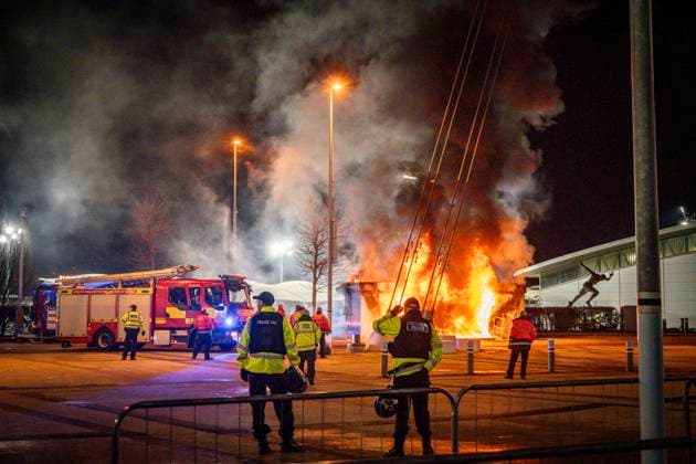 29th January 2025; Etihad Stadium, Manchester, England; UEFA Champions League Football, Manchester City versus Club Brugge; A merchandise stand goes up in flames outside the Etihad Stadium and the Fire Brigade arrive to deal with it  ActionPlus12745068 GodfreyxPitt