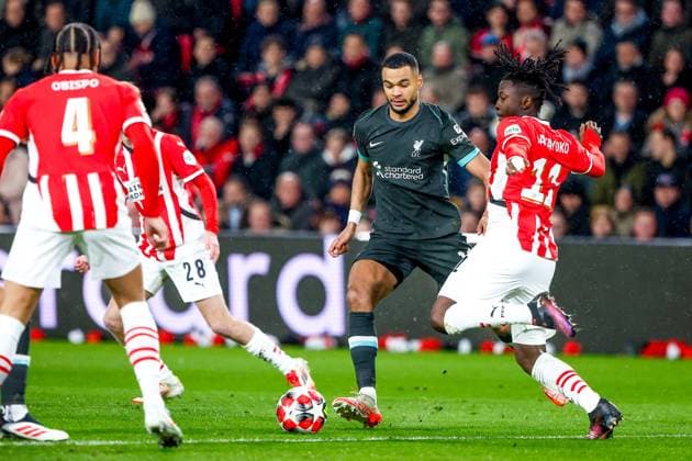 EINDHOVEN, 29-01-2025, Philips Stadium, UEFA Champions League season 2024 25, match between PSV and Liverpool, Liverpool FC player Cody Gakpo and PSV player Johan Bakayoko PSV - Liverpool  x27612580x Copyright: