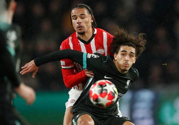 Armando Obispo of PSV Eindhoven and Jayden Danns of Liverpool PSV Eindhoven v Liverpool, UEFA Champions League, Group Stage, Football, Philips Stadion, Eindhoven, Netherlands - 29 Jan 2025 EDITORIAL USE ONLY No use with unauthorised audio, video, data, fixture lists, club league logos or live services. Online in-match use limited to 120 images, no video emulation. No use in betting, games or single club league player publications.  Copyright: xBartxStoutjesdijk Shutterstockx 15122172l