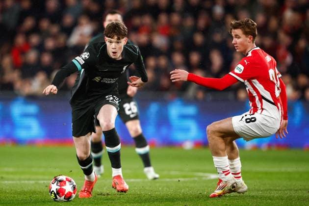 2025-01-29 PSV Eindhoven v Liverpool FC - UEFA Champions League 2024 25 League Phase MD8 EINDHOVEN, NETHERLANDS - JANUARY 29: James McConell of Liverpool FC battles for possession with Tygo Land of PSV during the UEFA Champions League 2024 25 League Phase MD8 match between PSV Eindhoven and Liverpool FC at PSV Stadion on January 29, 2025 in Eindhoven, Netherlands. Eindhoven PSV Stadion Netherlands Content not available for redistribution in The Netherlands directly or indirectly through any third parties. Copyright: xBroerxvanxdenxBoomx