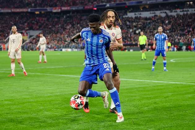 Sharani Zuberu SK Slovan Bratislava and Sacha Boey FC Bayern Muenchen battle for the ball, UEFA Champions League 2024 25 League Phase MD8, FC Bayern Munich v SK Slovan Bratislava, Allianz Arena on January 29, 2025 in Munich, Germany Photo by Marco Steinbrenner DeFodi Images Sharani Zuberu SK Slovan Bratislava and Sacha Boey FC Bayern Muenchen battle for the ball, UEFA Champions League 2024 25 League Phase MD8, FC Bayern München v SK Slovan Bratislava, Allianz Arena, January 29, 2025 in Munich, Germany Photo by Marco Steinbrenner DeFodi Images Defodi 700 muenchen bratis 20250129 028 Defodi-700