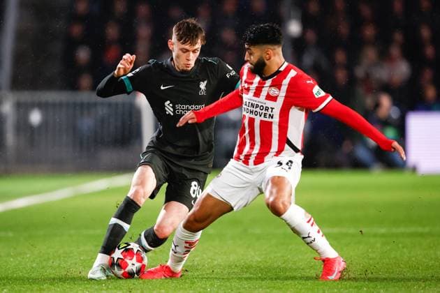 2025-01-29 PSV Eindhoven v Liverpool FC - UEFA Champions League 2024 25 League Phase MD8 EINDHOVEN, NETHERLANDS - JANUARY 29: Conor Bradley of Liverpool FC battles for possession with Ismael Saibari of PSV during the UEFA Champions League 2024 25 League Phase MD8 match between PSV Eindhoven and Liverpool FC at PSV Stadion on January 29, 2025 in Eindhoven, Netherlands. Eindhoven PSV Stadion Netherlands Content not available for redistribution in The Netherlands directly or indirectly through any third parties. Copyright: xBroerxvanxdenxBoomx