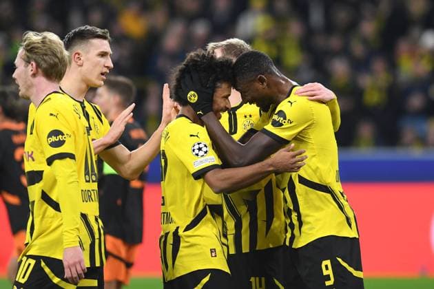 Karim Adeyemi Borussia Dortmund and Serhou Guirassy Borussia Dortmund celebrates after scoring his team™s first goal during the UEFA Champions League 2024 25 League Phase 8 matchday match between Borussia Dortmund and FC Shakhtar Donetsk, SIGNAL IDUNA PARK on January 29, 2025 in Dortmund, Germany, Germany Photo by Ralf Treese DeFodi Images Karim Adeyemi Borussia Dortmund and Serhou Guirassy Borussia Dortmund celebrates after scoring his team™s first goal with teammates during the UEFA Champions League 2024 25 League Phase MD8 match between Borussia Dortmund and FC Shakhtar Donetsk at Signal Iduna Park on January 29, 2025 in Dortmund, Germany Photo by Ralf Treese DeFodi Images Defodi 521 BVBDON20250129 012 Defodi-521