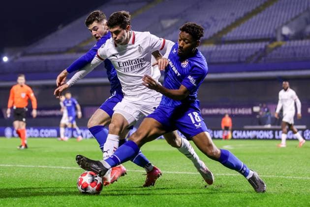 GNK Dinamo v AC Milan - UEFA Champions League 2024 25 League Phase MD8 Christian Pulisic of AC Milan fights for the ball with Martin Baturina and Ronael Pierre-Gabriel of Dinamo Zagreb during the UEFA Champions League 2024 25 League Phase MD8 match between GNK Dinamo and AC Milan at Maksimir Stadium on January 29, 2025. in Zagreb, Croatia.  LukaxStanzl PIXSELL