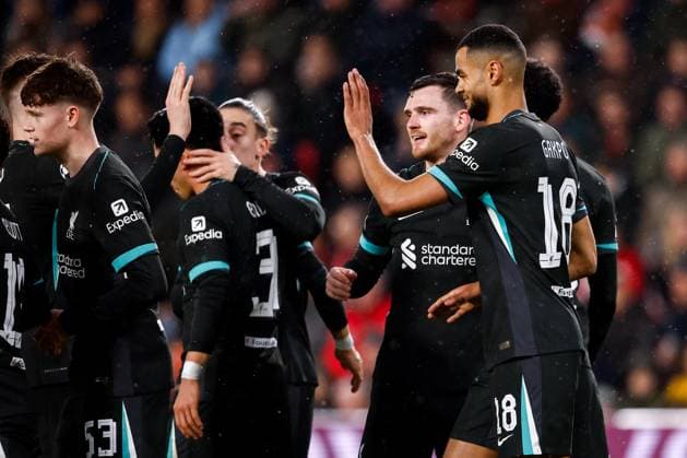 2025-01-29 PSV Eindhoven v Liverpool FC - UEFA Champions League 2024 25 League Phase MD8 EINDHOVEN, NETHERLANDS - JANUARY 29: Cody Gakpo of Liverpool FC celebrates after scoring his teams first goal (penalty), Andrew Robertson of Liverpool FC during the UEFA Champions League 2024 25 League Phase MD8 match between PSV Eindhoven and Liverpool FC at PSV Stadion on January 29, 2025 in Eindhoven, Netherlands. Eindhoven PSV Stadion Netherlands Content not available for redistribution in The Netherlands directly or indirectly through any third parties. Copyright: xBroerxvanxdenxBoomx