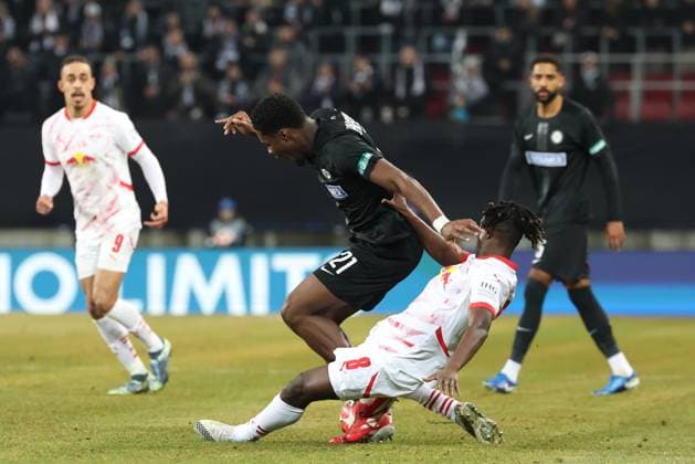 SOCCER - UEFA CL, Sturm vs RB Leipzig KLAGENFURT,AUSTRIA,29.JAN.25 - SOCCER - UEFA Champions League, SK Sturm Graz vs RasenBallsport Leipzig. Image shows Tochi Chukwuani (Sturm) and Amadou Haidara (RB Leipzig).  GEPAxpictures xChrisxBauer