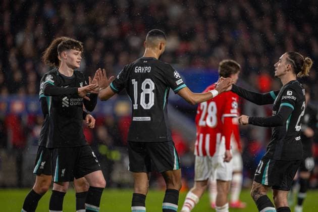 Football - UEFA Champions League - League Phase - PSV Eindhoven v Liverpool FC EINDHOVEN, NETHERLANDS - Wednesday, January 29, 2025: Liverpool s Cody Gakpo (C) celebrates after scoring the first goal with team-mates James McConnell (L) and Kostas Tsimikas (R) during the UEFA Champions League Matchday 8 game between PSV Eindhoven and Liverpool FC at the Philips Stadion. (Photo by David Rawcliffe Propaganda) EINDHOVEN Philips Stadion NORTH BRABANT NETHERLANDS  Copyright: xDavidxRawcliffex P2025-01-29-PSV_Liverpool-29