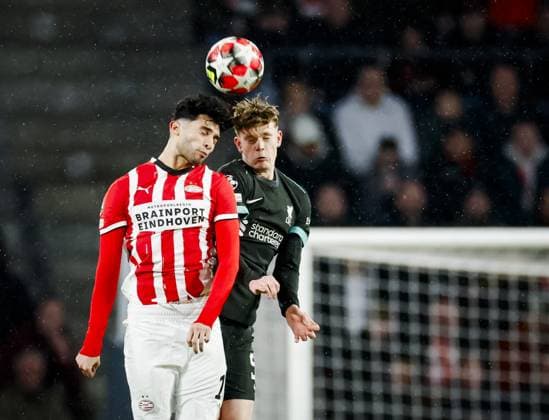 EINDHOVEN - (l-r) Ricardo Pepi of PSV Eindhoven and James McConnell of Liverpool FC during the UEFA Champions League match between PSV Eindhoven and Liverpool FC at Phillips Stadium on Jan. 29, 2025 in Eindhoven, Netherlands. ANP ROBIN VAN LONKHUIJSEN UEFA Champions League 2024 25 League Phase MD8 2024 25 xVIxANPxSportx xxANPxIVx 518654763 originalFilename: 518654763.jpg