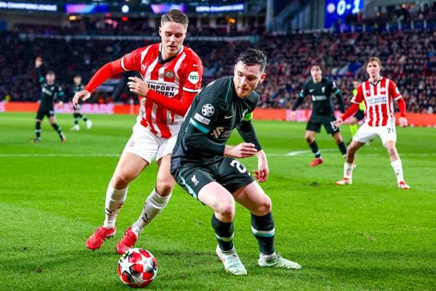 EINDHOVEN, 29-01-2025, Philips Stadium, UEFA Champions League season 2024 25, match between PSV and Liverpool, PSV player Joey Veerman and Liverpool FC player Andy Robertson PSV - Liverpool  x27613339x Copyright: