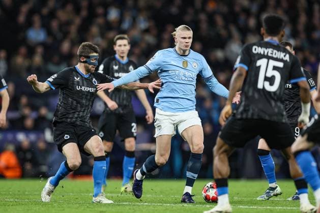 Club s Brandon Mechele and Manchester City s Erling Haaland fight for the ball during a soccer game between English Manchester City and Belgian Club Brugge KV, Wednesday 29 January 2025 in Manchester, United Kingdom, on the eight day (out of 8) of the UEFA Champions League league phase. BRUNOxFAHY  x111413682x