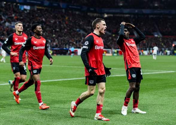 Leverkusen, Bayarena, 29.01.2025: Florian Wirtz of Leverkusen celebrates scoring the 1:0 goal with Jeremie Frimpong of Leverkusen during the championsleague match between Bayer 04 Leverkusen v. Sparta Prag.