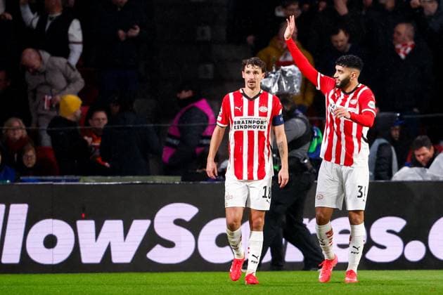 2025-01-29 PSV Eindhoven v Liverpool FC - UEFA Champions League 2024 25 League Phase MD8 EINDHOVEN, NETHERLANDS - JANUARY 29: Ismael Saibari of PSV celebrates after scoring his teams second goal, Olivier Boscagli of PSV during the UEFA Champions League 2024 25 League Phase MD8 match between PSV Eindhoven and Liverpool FC at PSV Stadion on January 29, 2025 in Eindhoven, Netherlands. Eindhoven PSV Stadion Netherlands Content not available for redistribution in The Netherlands directly or indirectly through any third parties. Copyright: xBroerxvanxdenxBoomx