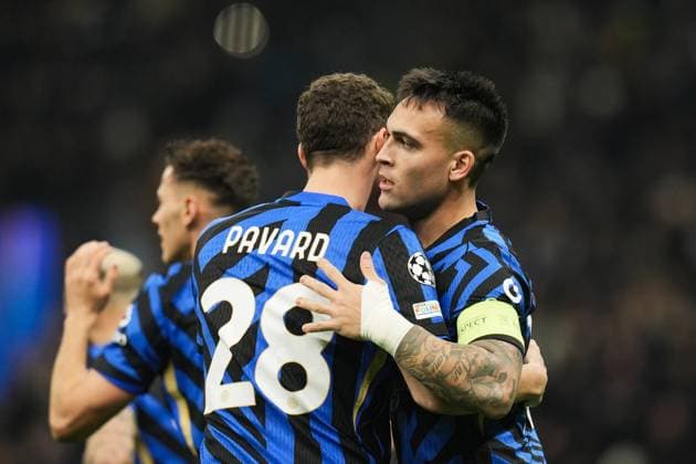 Inter Milan& x2019;s Lautaro Martinez celebrates with Inter Milan s Benjamin Pavard after scoring the 1-0 goal for his team during the Uefa Champions League 2024 2025 soccer match between Inter and Monaco at San Siro Stadium - Soccer - Milan, Italy - Wednesday January 29, 2025  Copyright: xMassimoxPaolone LaPressex