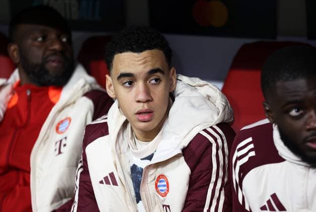 Munich, Germany, January 29, 2025 Football, Men, Champions League, Season 2024 2025, FC Bayern München SK Slovan Bratislava, Allianz Arena, Matchday 8 Jamal Musiala FC Bayern München sitting on the substitutes bench, looking to the left, thinking, pensive