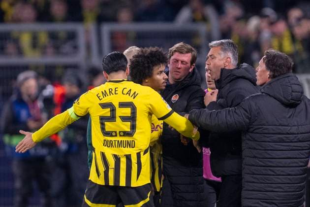 29 01 2025, Borussia Dortmund Shakhtar Donetsk, UEFA Champions League, Matchday 8 Dortmunds Emre Can l and Dortmunds Karim Adeyemi clash with Donetsk coach Marino Pusic IMPORTANT NOTE In accordance with UEFA regulations, it is prohibited to use or have used photographs taken in the stadium and or of the match in the form of sequential images and or video-like photo series Copyright: xDavidxInderliedx