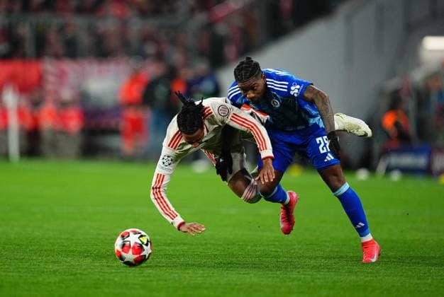 January 29 2025: Michael Olise (Bayern Munich) and Cesar Blackman (Slovan Bratislava) battle for the ball during a UEFA Champions League MD8 game, Bayern Munich vs Slovan Bratislava, at Allianz Arena, Munich, Germany. Ulrik Pedersen - ZUMAc04_ 20250129_zma_c04_017 Copyright: xCSMx