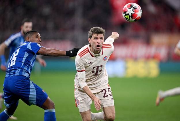 FOOTBALL CHAMPIONS LEAGUE SEASON 2024 2025 Preliminary Round 8 Matchday FC Bayern Muenchen Slovan Bratislava 29 01 2025 Cesar Blackman left, Slovan Bratislava v Thomas Mueller right, FC Bayern Muenchen