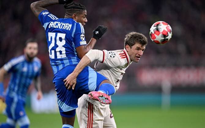 FOOTBALL CHAMPIONS LEAGUE SEASON 2024 2025 Preliminary Round 8 Matchday FC Bayern Muenchen Slovan Bratislava 29 01 2025 Cesar Blackman left, Slovan Bratislava v Thomas Mueller right, FC Bayern Muenchen