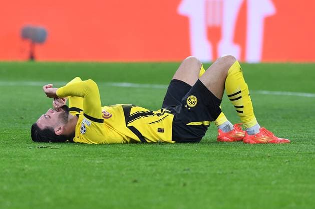 Soccer Champions League Matchday 8 Borussia Dortmund Shakhtar Donetsk on 29 01 2025 at Signal Iduna Park in Dortmund Ramy Bensebaini Dortmund injured on the ground xRx
