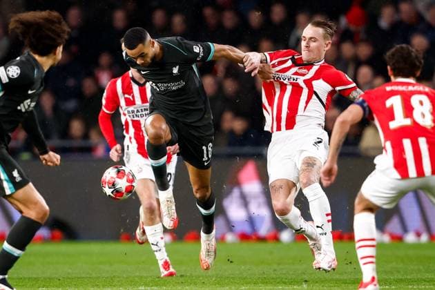 2025-01-29 PSV Eindhoven v Liverpool FC - UEFA Champions League 2024 25 League Phase MD8 EINDHOVEN, NETHERLANDS - JANUARY 29: Cody Gakpo of Liverpool FC is tackling Rick Karsdorp of PSV during the UEFA Champions League 2024 25 League Phase MD8 match between PSV Eindhoven and Liverpool FC at PSV Stadion on January 29, 2025 in Eindhoven, Netherlands. Eindhoven PSV Stadion Netherlands Content not available for redistribution in The Netherlands directly or indirectly through any third parties. Copyright: xBroerxvanxdenxBoomx
