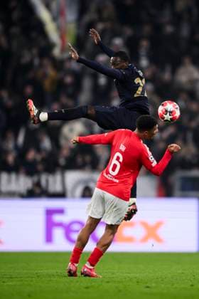 Juventus FC v SL Benfica - UEFA Champion League Timothy Weah of Juventus FC competes for the ball with Alexander Bah of SL Benfica during the UEFA Champions League 2024 25 league phase football match between Juventus FC and SL Benfica. Turin Italy Copyright: xNicolòxCampox