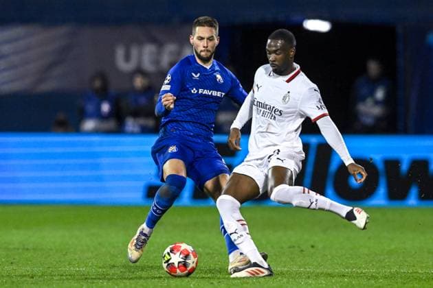 GNK Dinamo v AC Milan - UEFA Champions League 2024 25 League Phase MD8 Marko Pjaca of Dinamo Zageb competes for the ball with Fikayo Tomori of AC Milan during the UEFA Champions League 2024 25 League Phase MD8 match between GNK Dinamo and AC Milan at Maksimir Stadium on January 29, 2025. in Zagreb, Croatia.  MarkoxLukunic PIXSELL
