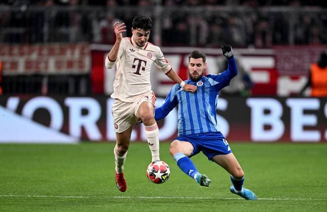 FOOTBALL CHAMPIONS LEAGUE SEASON 2024 2025 Preliminary Round 8 Matchday FC Bayern Muenchen Slovan Bratislava 29 01 2025 Aleksandar Pavlovic left, FC Bayern Muenchen vs Kenan Bajric right, Slovan Bratislava