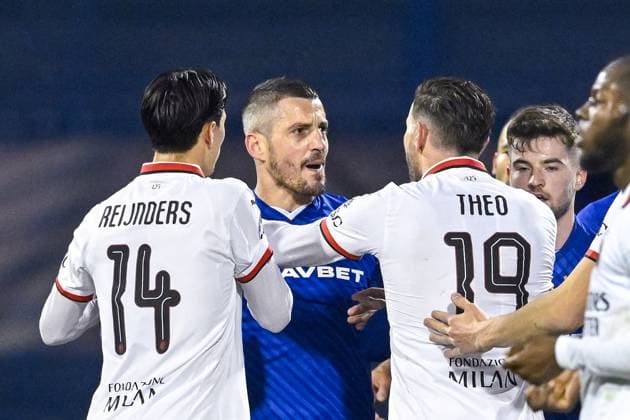 GNK Dinamo v AC Milan - UEFA Champions League 2024 25 League Phase MD8 Arijan Ademi of Dinamo Zagreb argues with Theo Hernandez of AC Milan during the UEFA Champions League 2024 25 League Phase MD8 match between GNK Dinamo and AC Milan at Maksimir Stadium on January 29, 2025. in Zagreb, Croatia.  MarkoxLukunic PIXSELL