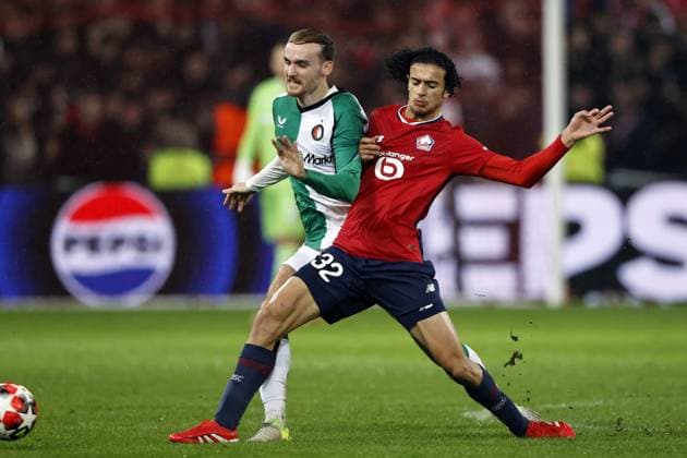 LILLE - (l-r) Thomas Beelen of Feyenoord, Ayyoub Bouaddi of Lille OSC during the UEFA Champions League match between Lille OSC and Feyenoord at Stade Pierre Mauroy on Jan. 29, 2025 in Lille, France. ANP MAURICE VAN STEEN UEFA Champions League 2024 25 League Phase MD8 2024 25 xVIxANPxSportx xxANPxIVx 518658639 originalFilename: 518658639.jpg