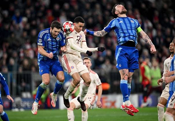 FOOTBALL CHAMPIONS LEAGUE SEASON 2024 2025 Preliminary Round 8 Matchday FC Bayern Muenchen Slovan Bratislava 29 01 2025 Kevin Wimmer left, Slovan Bratislava v Jamal Musiala center, FC Bayern Muenchen v Guram Kashia right, Slovan Bratislava