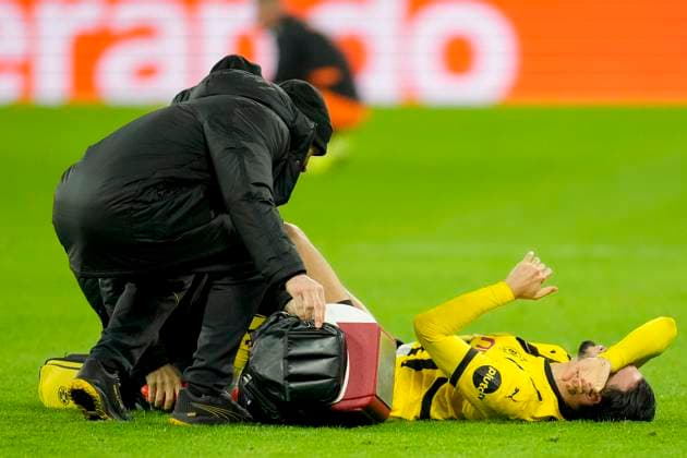 Ramy Bensebaini Borussia Dortmund on the ground during the UEFA Champions League 2024 25 League Phase MD8 match between Borussia Dortmund and FC Shakhtar Donetsk at Signal Iduna Park on January 29, 2025 in Dortmund, Germany Photo by Alex Gottschalk DeFodi Images Defodi 001 20250129 1320740 Defodi-001
