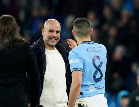 Manchester, England, 29th January 2025. Manchester City™s head coach Pep Guardiola celebrates at the final whistle with Manchester City s Mateo Kovacic during the UEFA Champions League match at the Etihad Stadium, Manchester. Picture credit should read: Andrew Yates Sportimage EDITORIAL USE ONLY. No use with unauthorised audio, video, data, fixture lists, club league logos or live services. Online in-match use limited to 120 images, no video emulation. No use in betting, games or single club league player publications. SPI_083_AY_MAN_CITY_BRUGGE SPI-3642-0089