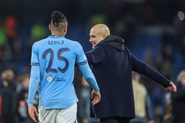 UEFA Champions League Matchday 8 of 8 Manchester City v Club Brugge Manuel Akanji of Manchester City celebrates the win with Pep Guardiola manager of Manchester City during the UEFA Champions League Matchday 8 of 8 Manchester City vs Club Brugge at Etihad Stadium, Manchester, United Kingdom, 29th January 2025 (Photo by Mark Cosgrove News Images) Manchester Etihad Stadium Manchester United, ManU Kingdom Copyright: xMarkxCosgrove NewsxImagesx