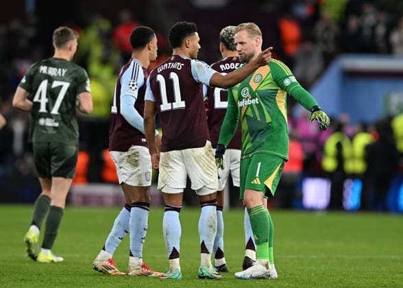 Birmingham, England, 29th January 2025. Aston Villa™s Ollie Watkins with Celtic s goalkeeper Kasper Schmeichel at the final whistle during the UEFA Champions League match at Villa Park, Birmingham. Picture credit should read: Cody Froggatt Sportimage EDITORIAL USE ONLY. No use with unauthorised audio, video, data, fixture lists, club league logos or live services. Online in-match use limited to 120 images, no video emulation. No use in betting, games or single club league player publications. SPI_098_CF_Aston_Villa_Celtic SPI-3641-0098