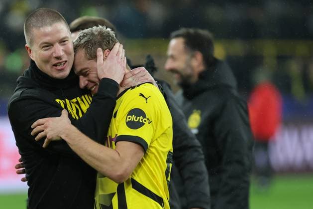 UEFA Champions League - Borussia Dortmund - Schachtar Donezk am 29.01.2025 im Signal Iduna Park in Dortmund Jubel und Freude nach dem Schlusspfiff bei Trainer Mike Tullberg (Dortmund) und Julian Ryerson (Dortmund 26) MH