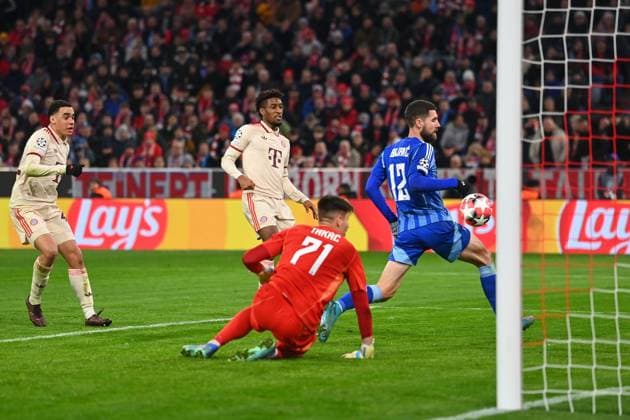Goal Kingsley COMAN Bayern Muenchen to 3 0, action, shot on goal against Kenan BAJRIC Bratislava and goalkeeper Domini TAKAC Bratislava , penalty area scene Soccer Champions League league phase, FC Bayern Muenchen SK Slovan Bratislava 3 1 on 29 01 2025 , A L L I A N Z A R E N A