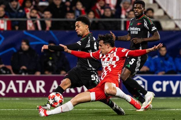 January 29, 2025, Girona, Barcelona, Spain: Alejandro Frances of Girona FC and Ethan Nwaneri R of Arsenal FC seen in action during the match of matchday 2 to UEFA Champions League between Girona F.C and Arsenal F.C at Estadi Montilivi. Finals score; Girona F.C 1:2 Arsenal FC Girona Spain - ZUMAs316 20250129_znp_s316_025 Copyright: xMartixSeguraxRamonedax