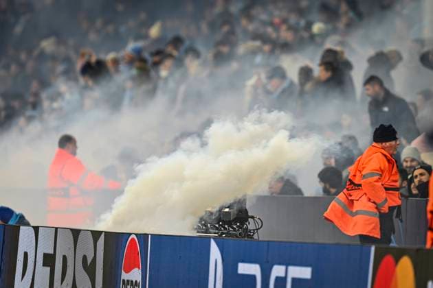 29th January 2025; Etihad Stadium, Manchester, England; UEFA Champions League Football, Manchester City versus Club Brugge; Stewards and fans are engulfed by the smoke for the pre-match display  ActionPlus12745253 GodfreyxPitt
