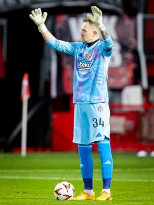 2025-01-30 FC Twente v Besiktas JK - UEFA Europa League 2024 25 League Phase MD8 ENSCHEDE, NETHERLANDS - JANUARY 30: Goalkeeper Mert Gunok of Besiktas JK gestures during the UEFA Europa League 2024 25 League Phase MD8 match between FC Twente and Besiktas JK at De Grolsch Veste on January 30, 2025 in Enschede, Netherlands. Enschede De Grolsch Veste Netherlands Content not available for redistribution in The Netherlands directly or indirectly through any third parties. Copyright: xPeterxLousx