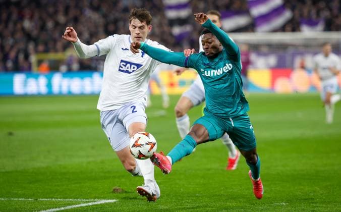 Hoffenheim s Robin Hranac and Anderlecht s Francis Amuzu fight for the ball during a soccer game between Belgian soccer team RSC Anderlecht and German Hoffenheim, Thursday 30 January 2025 in Brussels, on day 8 8 of the group stage of the UEFA Europa League tournament. VIRGINIExLEFOUR  x111478568x
