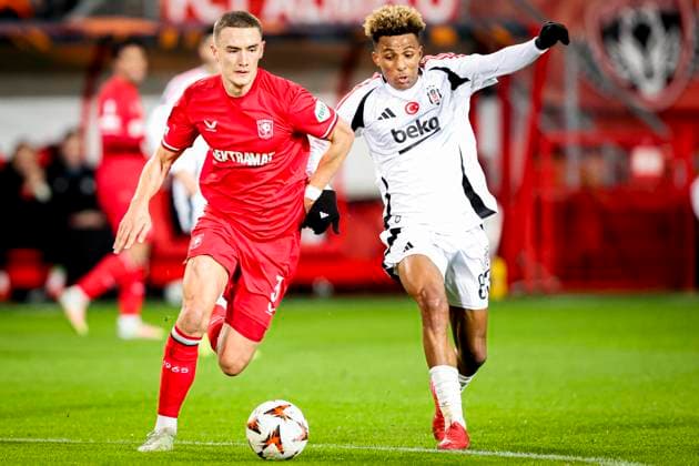 2025-01-30 FC Twente v Besiktas JK - UEFA Europa League 2024 25 League Phase MD8 ENSCHEDE, NETHERLANDS - JANUARY 30: Gustaf Lagerbielke of FC Twente battles for possession with Gedson Fernandes of Besiktas JK during the UEFA Europa League 2024 25 League Phase MD8 match between FC Twente and Besiktas JK at De Grolsch Veste on January 30, 2025 in Enschede, Netherlands. Enschede De Grolsch Veste Netherlands Content not available for redistribution in The Netherlands directly or indirectly through any third parties. Copyright: xPeterxLousx