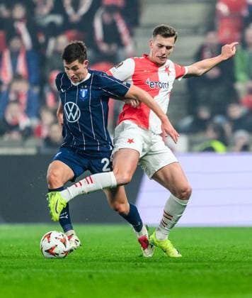 250130 Lasse Berg Johnsen of Malmö FF and Daniel Fila of Slavia Prag during the UEFA Europa League football match between Slavia Prag and Malmö FF on January 30, 2025 in Prague Photo Mathilda Ahlberg BILDBYRAN kod MA MA0779 fotboll football soccer fotball uefa europa league europa league slavia prag malmö ff bbeng  Copyright: MATHILDAxAHLBERG BB250130MA078