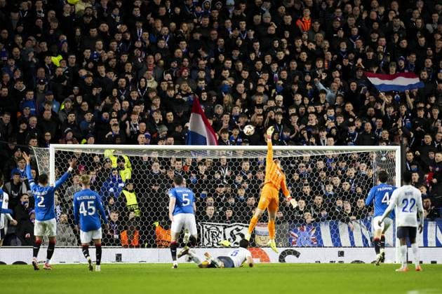 Kevin Mac Allister of Union Saint-Gilloise beats Rangers goalkeeper Jack Butland to make it 2-1 Rangers v Union Saint-Gilloise, UEFA Europa League, Group Stage, Football, Ibrox Stadium, Glasgow, UK - 30 Jan 2025 EDITORIAL USE ONLY No use with unauthorised audio, video, data, fixture lists, club league logos or live services. Online in-match use limited to 120 images, no video emulation. No use in betting, games or single club league player publications. Copyright: xStuartxWallace Shutterstockx 15122181db
